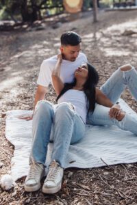 cutecouple Cute couple laying on a picnic blanket